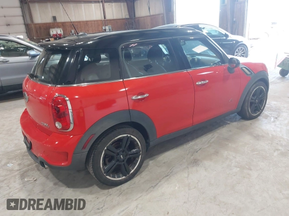 2011 MINI Countryman S with VIN WMWZC5C54BWL52725, listed as a IAAI auction lot 42086776 with 214,596 mi miles and . Bid and sale history available at DreamBid. Image 4.