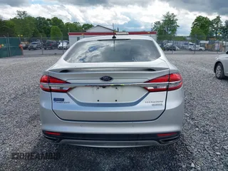 2017 Ford Fusion Titanium with VIN 3FA6P0K99HR112234, listed as a IAAI auction lot 42332700 with 106,685 mi miles and . Bid and sale history available at DreamBid. Image 16.