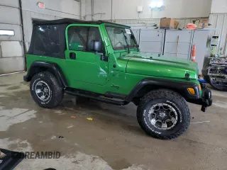 2002 Jeep Wrangler Sport with VIN 1J4FA49S72P701075, listed as a Copart auction lot 66894914 with 169,971 mi miles and Salvage Title. Bid and sale history available at carsss.com. Image 4.