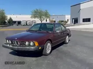 1984 BMW 6 Series z VIN WBAEB7402E6728083, wystawiony jako Copart lot #84704605 z przebiegiem 291 737 mil mil oraz Czysty tytuł • Clean title. Historia ofert i sprzedaży dostępna na DreamBid. Obrazek 11.