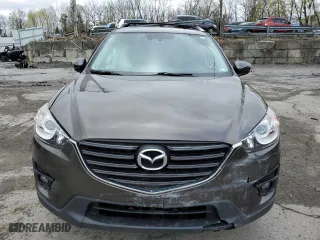 2016 Mazda CX-5 Grand Touring with VIN JM3KE4DY5G0848717, listed as a Copart auction lot 53249895 with 86,746 mi miles and Salvage Title. Bid and sale history available at carsss.com. Image 5.