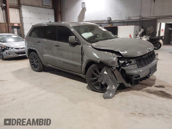 2019 Jeep Grand Cherokee Laredo E with VIN 1C4RJFAG9KC667394, listed as a IAAI auction lot 41316264 with 55,156 mi miles. Bid and sale history available at carsss.com. Image 1.