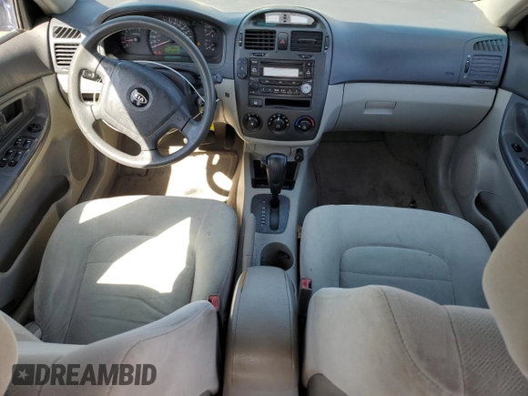 2006 Kia Spectra EX with VIN KNAFE121965253446, listed as a Copart auction lot 53084675 with 195,488 mi miles and Salvage Title. Bid and sale history available at DreamBid. Image 8.