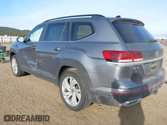 2022 Volkswagen Atlas SE z VIN 1V2HR2CA4NC523017, wystawiony jako IAAI lot #41754371 z przebiegiem 23 745 mil mil oraz . Historia ofert i sprzedaży dostępna na DreamBid. Obrazek 3.