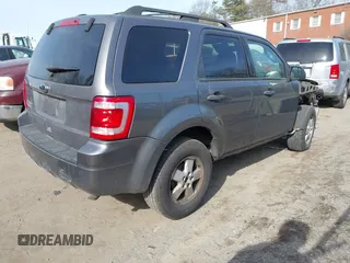 2010 Ford Escape XLT z VIN 1FMCU9D71AKC60423, wystawiony jako IAAI lot #41759168 z przebiegiem 143 734 mil mil oraz . Historia ofert i sprzedaży dostępna na DreamBid. Obrazek 4.