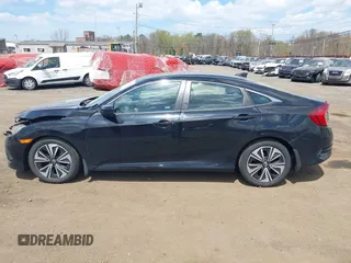 2017 Honda Civic EX-L z VIN 2HGFC1F72HH647147, wystawiony jako IAAI lot #42064784 z przebiegiem 139 893 mil mil oraz . Historia ofert i sprzedaży dostępna na DreamBid. Obrazek 14.
