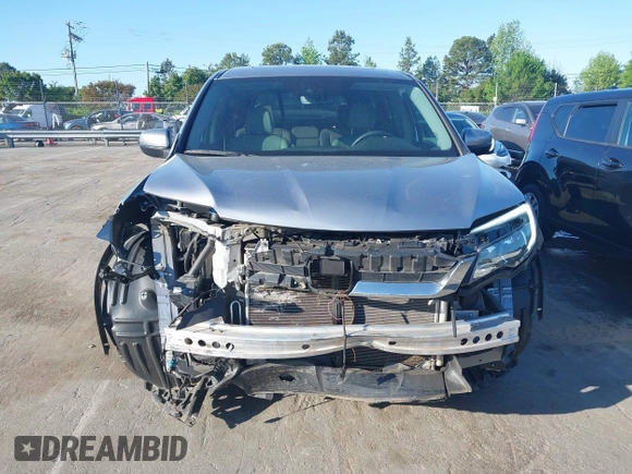 2020 Honda Pilot EX-L z VIN 5FNYF5H51LB016163, wystawiony jako IAAI lot #42030430 z przebiegiem 65 383 mil mil oraz . Historia ofert i sprzedaży dostępna na DreamBid. Obrazek 12.