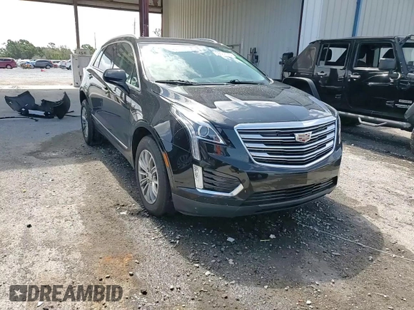 2017 Cadillac XT5 Luxury AWD with VIN 1GYKNDRS6HZ243674, listed as a Copart auction lot 59569145 with 74,550 mi miles and Salvage title. Bid and sale history available at DreamBid. Image 15.