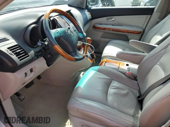 2009 Lexus RX 350 with VIN 2T2HK31U79C113863, listed as a Copart auction lot 50185735 with 127,593 mi miles and Salvage Title. Bid and sale history available at DreamBid. Image 7.