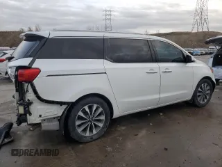 2015 Kia Sedona SX with VIN KNDMC5C19F6032915, listed as a Copart auction lot 82626784 with 135,594 mi miles and Salvage Title. Bid and sale history available at carsss.com. Image 3.