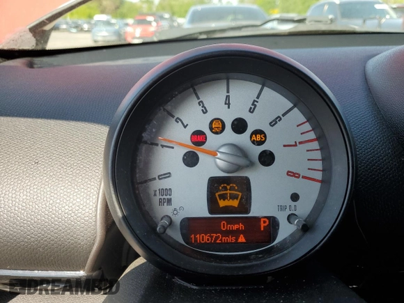 2013 MINI Countryman S z VIN WMWZC3C55DWP20563, wystawiony jako Copart lot #55493605 z przebiegiem 110 672 mil mil oraz Szkoda całkowita • Salvage title. Historia ofert i sprzedaży dostępna na DreamBid. Obrazek 9.