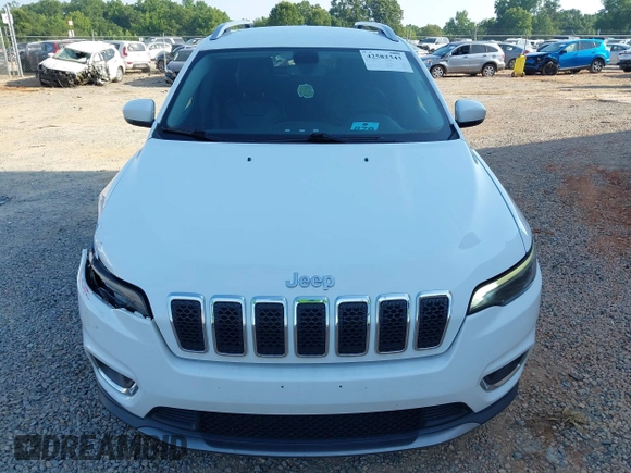 2020 Jeep Cherokee Limited with VIN 1C4PJMDXXLD612052, listed as a IAAI auction lot 42582343 with 96,072 mi miles and . Bid and sale history available at DreamBid. Image 12.