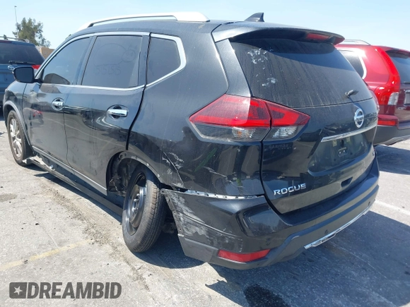 2019 Nissan Rogue SV with VIN KNMAT2MT8KP506083, listed as a IAAI auction lot 41965304 with 99,872 mi miles and . Bid and sale history available at DreamBid. Image 3.