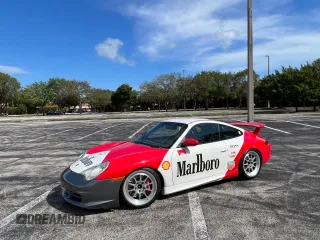 2004 Porsche 911 z VIN WP0AC299X4S692464, wystawiony jako Copart lot #50950705 z przebiegiem 44 494 mil mil oraz Czysty tytuł • Clean title. Historia ofert i sprzedaży dostępna na DreamBid. Obrazek 1.