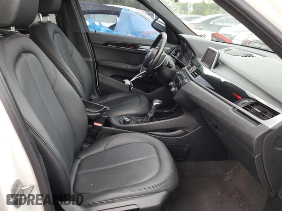 2018 BMW X1 sDrive28i with VIN WBXHU7C38J5H40248, listed as a Copart auction lot 66158662 with 59,903 mi miles. Bid and sale history available at carsss.com. Image 5.