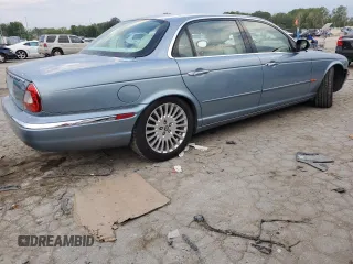 2005 Jaguar XJ VDP with VIN SAJWA82C45SG36059, listed as a Copart auction lot 69289734 with 0 mi miles and Salvage Title. Bid and sale history available at carsss.com. Image 3.