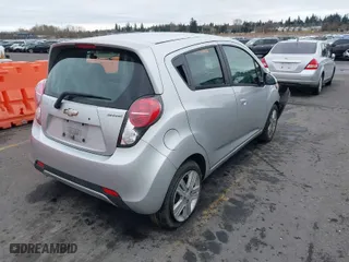 2014 Chevrolet Spark LT with VIN KL8CD6S95EC458499, listed as a IAAI auction lot 41614652 with 133,628 mi miles. Bid and sale history available at carsss.com. Image 4.