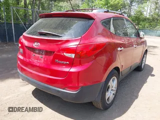 2013 Hyundai Tucson GLS with VIN KM8JU3AC9DU699108, listed as a IAAI auction lot 42105660 with 144,703 mi miles. Bid and sale history available at carsss.com. Image 4.