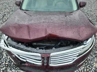 2017 Lincoln MKC Reserve with VIN 5LMCJ3C9XHUL70357, listed as a Copart auction lot 59607505 with 74,500 mi miles and Salvage title. Bid and sale history available at DreamBid. Image 12.
