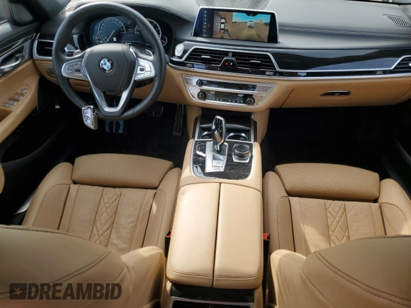 2019 BMW 7 Series 750i xDrive with VIN WBA7B0C53KG527537, listed as a Copart auction lot 64113345 with 36,820 mi miles and Salvage title. Bid and sale history available at DreamBid. Image 8.