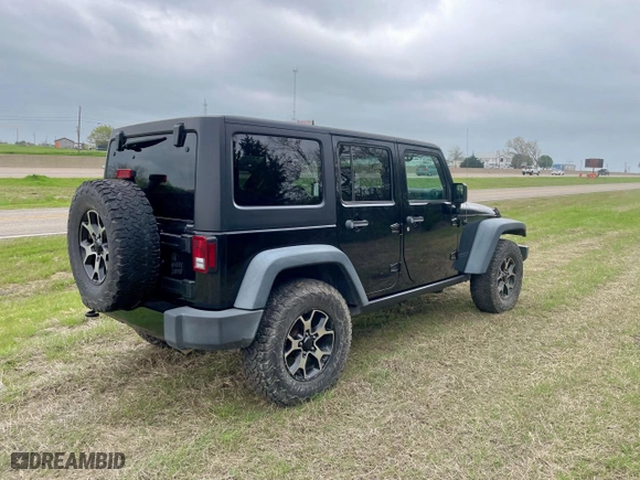2016 Jeep Wrangler Unlimited Sport with VIN 1C4BJWDG7GL103053, listed as a Copart auction lot 51662955 with 99,951 mi miles and Clean Title. Bid and sale history available at carsss.com. Image 4.