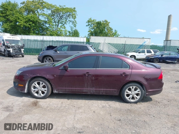 2012 Ford Fusion SE z VIN 3FAHP0HA6CR426765, wystawiony jako IAAI lot #42388306 z przebiegiem 120 016 mil mil oraz . Historia ofert i sprzedaży dostępna na DreamBid. Obrazek 14.