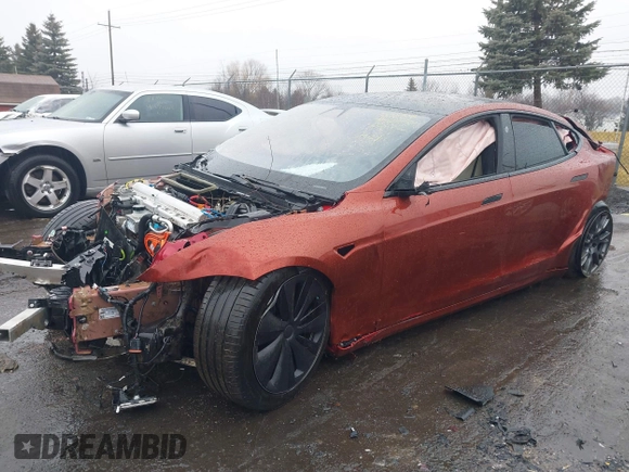 2021 Tesla Model S Plaid z VIN 5YJSA1E64MF441923, wystawiony jako IAAI lot #41465456 z przebiegiem Nie podano mil oraz . Historia ofert i sprzedaży dostępna na DreamBid. Obrazek 17.