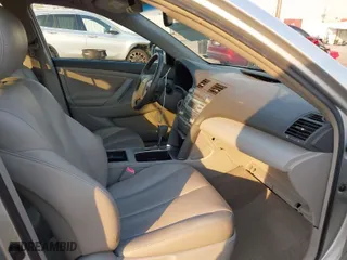 2007 Toyota Camry Hybrid with VIN JTNBB46K573027590, listed as a IAAI auction lot 41307314 with 159,168 mi miles. Bid and sale history available at carsss.com. Image 5.