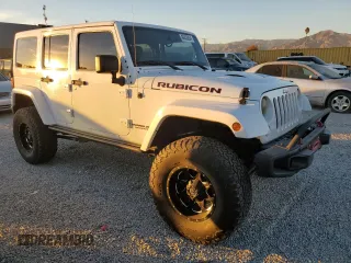 2015 Jeep Wrangler Unlimited Rubicon with VIN 1C4BJWFG5FL659017, listed as a Copart auction lot 84435034 with 69,915 mi miles and Salvage Title. Bid and sale history available at carsss.com. Image 4.