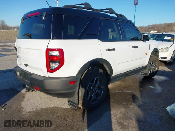 2022 Ford Bronco Sport Badlands z VIN 3FMCR9D93NRE10343, wystawiony jako IAAI lot #41446985 z przebiegiem 37 955 mil mil oraz . Historia ofert i sprzedaży dostępna na DreamBid. Obrazek 4.