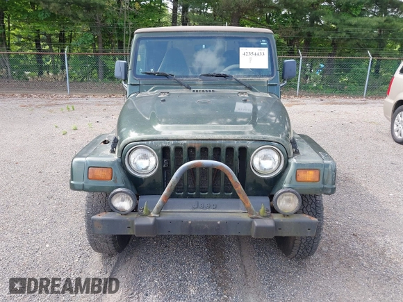 1998 Jeep Wrangler Sahara z VIN 1J4FY49SXWP716218, wystawiony jako IAAI lot #42354433 z przebiegiem 234 378 mil mil oraz . Historia ofert i sprzedaży dostępna na DreamBid. Obrazek 6.