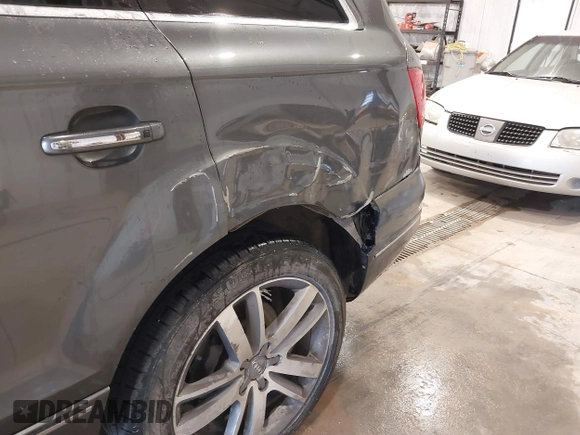 2014 Audi Q7 3.0T Premium Plus with VIN WA1LGAFE7ED004302, listed as a IAAI auction lot 41793547 with 157,351 mi miles. Bid and sale history available at carsss.com. Image 6.