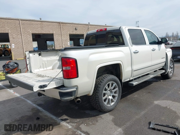 2014 GMC Sierra 1500 Denali z VIN 3GTU2WEJ3EG551266, wystawiony jako IAAI lot #41631624 z przebiegiem 120 214 mil mil oraz . Historia ofert i sprzedaży dostępna na DreamBid. Obrazek 4.
