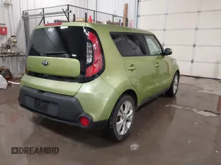 2015 Kia Soul + with VIN KNDJP3A57F7774967, listed as a IAAI auction lot 41376725 with 71,284 mi miles. Bid and sale history available at carsss.com. Image 4.