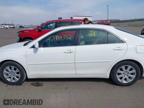 2007 Toyota Camry LE with VIN JTNBK46K973018732, listed as a IAAI auction lot 42000392 with 263,788 mi miles and . Bid and sale history available at DreamBid. Image 14.