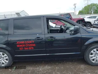 2017 Dodge Grand Caravan SE z VIN 2C4RDGBG0HR605507, wystawiony jako IAAI lot #42168499 z przebiegiem 169 422 mil mil oraz . Historia ofert i sprzedaży dostępna na DreamBid. Obrazek 13.