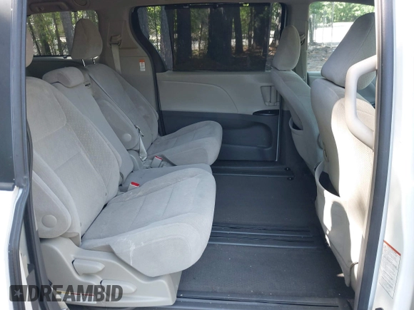 2016 Toyota Sienna LE AAS z VIN 5TDKK3DC4GS690593, wystawiony jako IAAI lot #42134347 z przebiegiem 175 063 mil mil oraz . Historia ofert i sprzedaży dostępna na DreamBid. Obrazek 8.