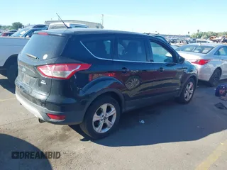 2013 Ford Escape SE with VIN 1FMCU9GX5DUB79784, listed as a IAAI auction lot 42733276 with 110,961 mi miles and . Bid and sale history available at DreamBid. Image 4.
