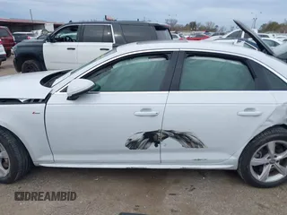 2019 Audi A4 Premium z VIN WAUDNAF4XKA017272, wystawiony jako IAAI lot #41332834 z przebiegiem 68 342 mil mil oraz . Historia ofert i sprzedaży dostępna na DreamBid. Obrazek 14.