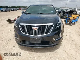 2021 Cadillac XT5 FWD Luxury with VIN 1GYKNAR42MZ120996, listed as a Copart auction lot 63314655 with 49,977 mi miles and Salvage title. Bid and sale history available at DreamBid. Image 5.