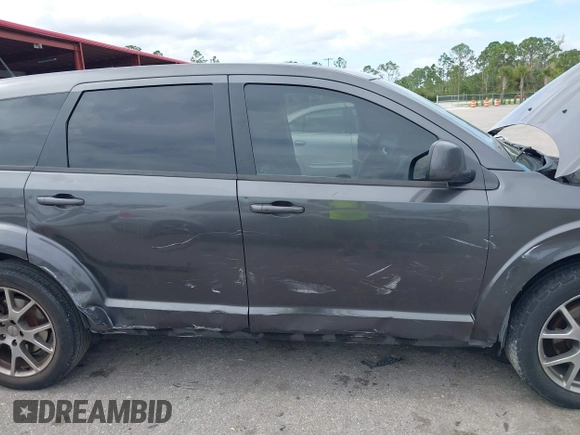 2016 Dodge Journey R/T with VIN 3C4PDCEG9GT174690, listed as a IAAI auction lot 38620294 with 112,175 mi miles and . Bid and sale history available at DreamBid. Image 12.