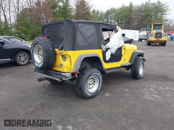 2000 Jeep Wrangler Sport with VIN 1J4FA49S9YP736984, listed as a IAAI auction lot 42055385 with 191,910 mi miles and . Bid and sale history available at DreamBid. Image 4.