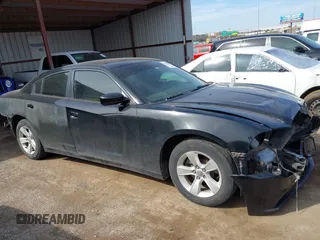 2014 Dodge Charger SE with VIN 2C3CDXBG8EH267589, listed as a IAAI auction lot 41793004 with 154,771 mi miles and . Bid and sale history available at DreamBid. Image 14.