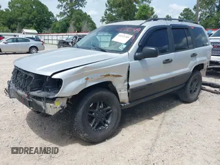 2002 Jeep Grand Cherokee Laredo with VIN 1J4GX48S32C288387, listed as a IAAI auction lot 42212249 with 151,028 mi miles and . Bid and sale history available at DreamBid. Image 18.