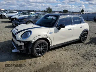 2019 MINI Hardtop 4 Door Cooper S with VIN WMWXU3C51K2H88452, listed as a Copart auction lot 44001965 with 64,968 mi miles and Salvage Title. Bid and sale history available at DreamBid. Image 1.