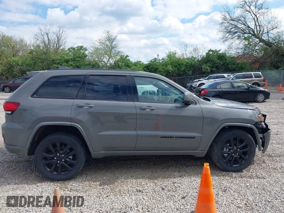 2021 Jeep Grand Cherokee Laredo E with VIN 1C4RJFAG4MC700384, listed as a IAAI auction lot 42192672 with 54,525 mi miles and . Bid and sale history available at DreamBid. Image 14.