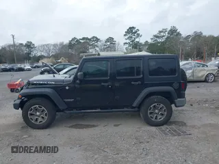 2017 Jeep Wrangler Unlimited Rubicon with VIN 1C4BJWFG4HL679150, listed as a IAAI auction lot 41720239 with 81,142 mi miles and . Bid and sale history available at DreamBid. Image 15.