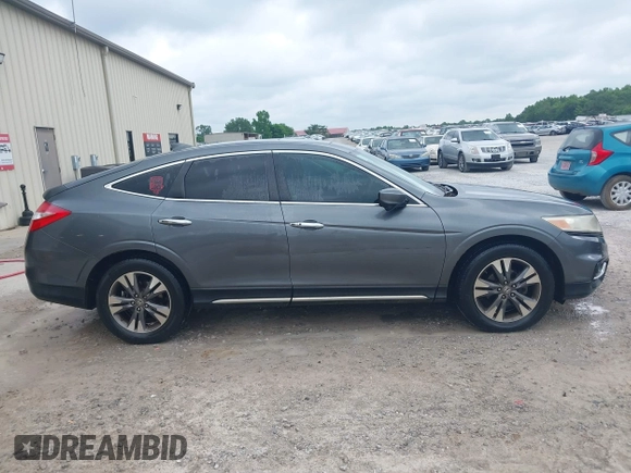 2013 Honda Crosstour EX-L z VIN 5J6TF1H56DL002352, wystawiony jako IAAI lot #42303791 z przebiegiem 178 443 mil mil oraz . Historia ofert i sprzedaży dostępna na DreamBid. Obrazek 13.
