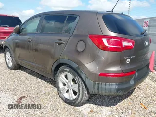 2013 Kia Sportage LX with VIN KNDPB3A24D7416706, listed as a IAAI auction lot 42525729 with 166,798 mi miles and . Bid and sale history available at DreamBid. Image 3.