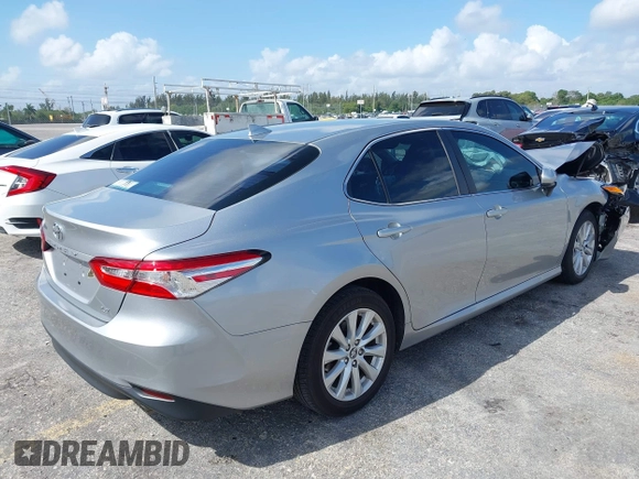 2019 Toyota Camry LE with VIN 4T1B11HK4KU249720, listed as a IAAI auction lot 41940728 with 35,891 mi miles and . Bid and sale history available at DreamBid. Image 4.